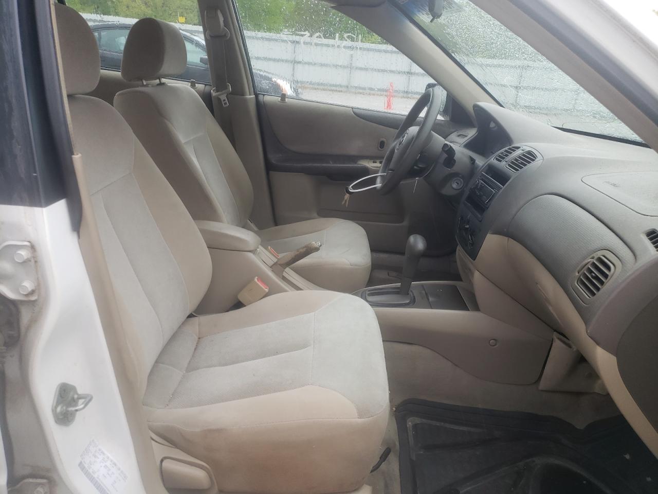 Photo 5 from auction – 2002 MAZDA PROTEGE DX with VIN JM1BJ225420558673