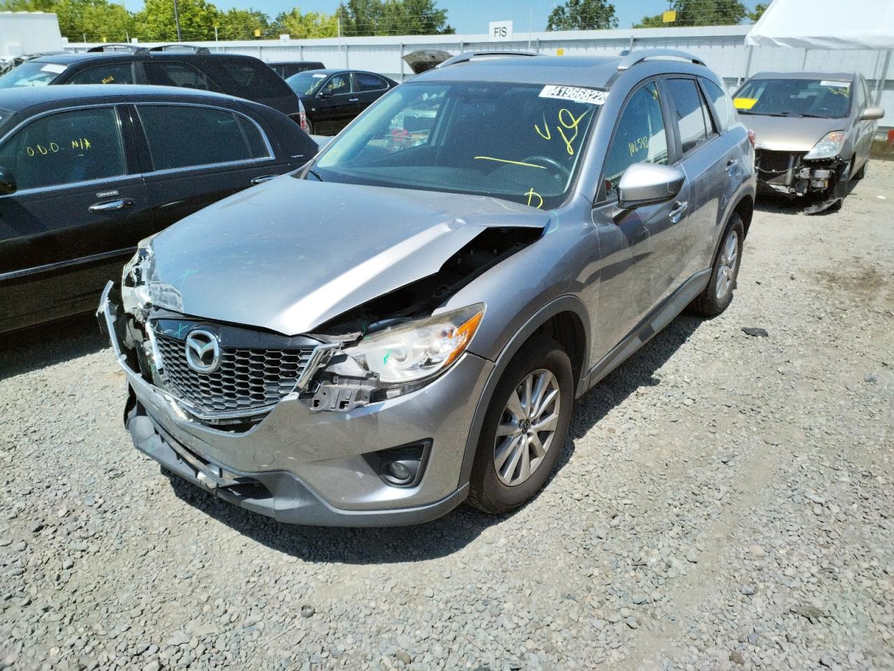 Photo 2 from auction – 2014 MAZDA CX-5 TOURI with VIN JM3KE2CY2E0306929