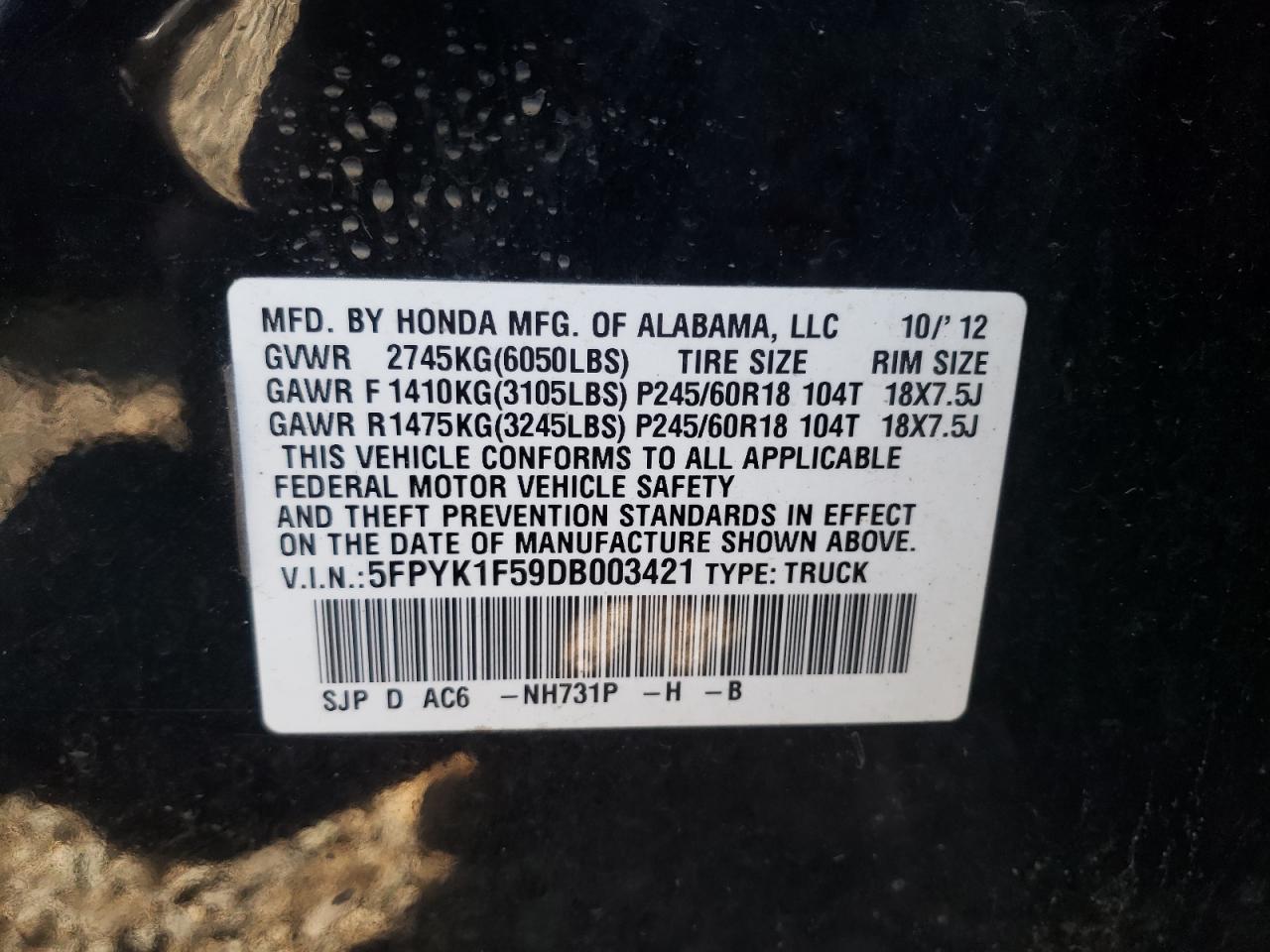Photo 10 from auction – 2013 HONDA RIDGELINE with VIN 5FPYK1F59DB003421