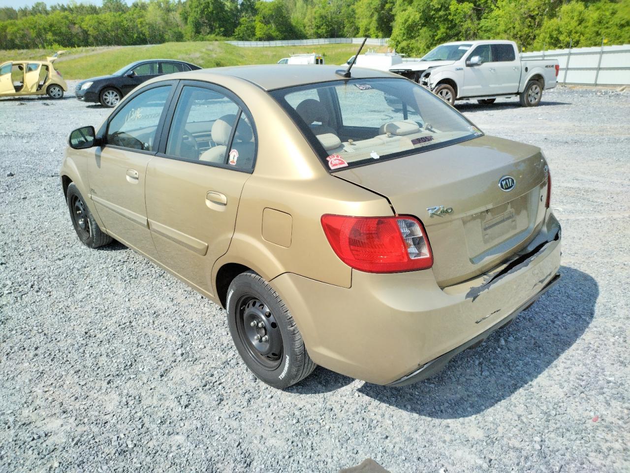 Photo 3 from auction – 2011 KIA RIO BASE with VIN KNADH4A36B6912042