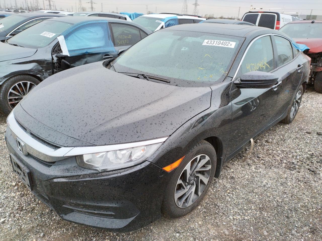 Photo 2 from auction – 2016 HONDA CIVIC EX with VIN 19XFC2F75GE056440