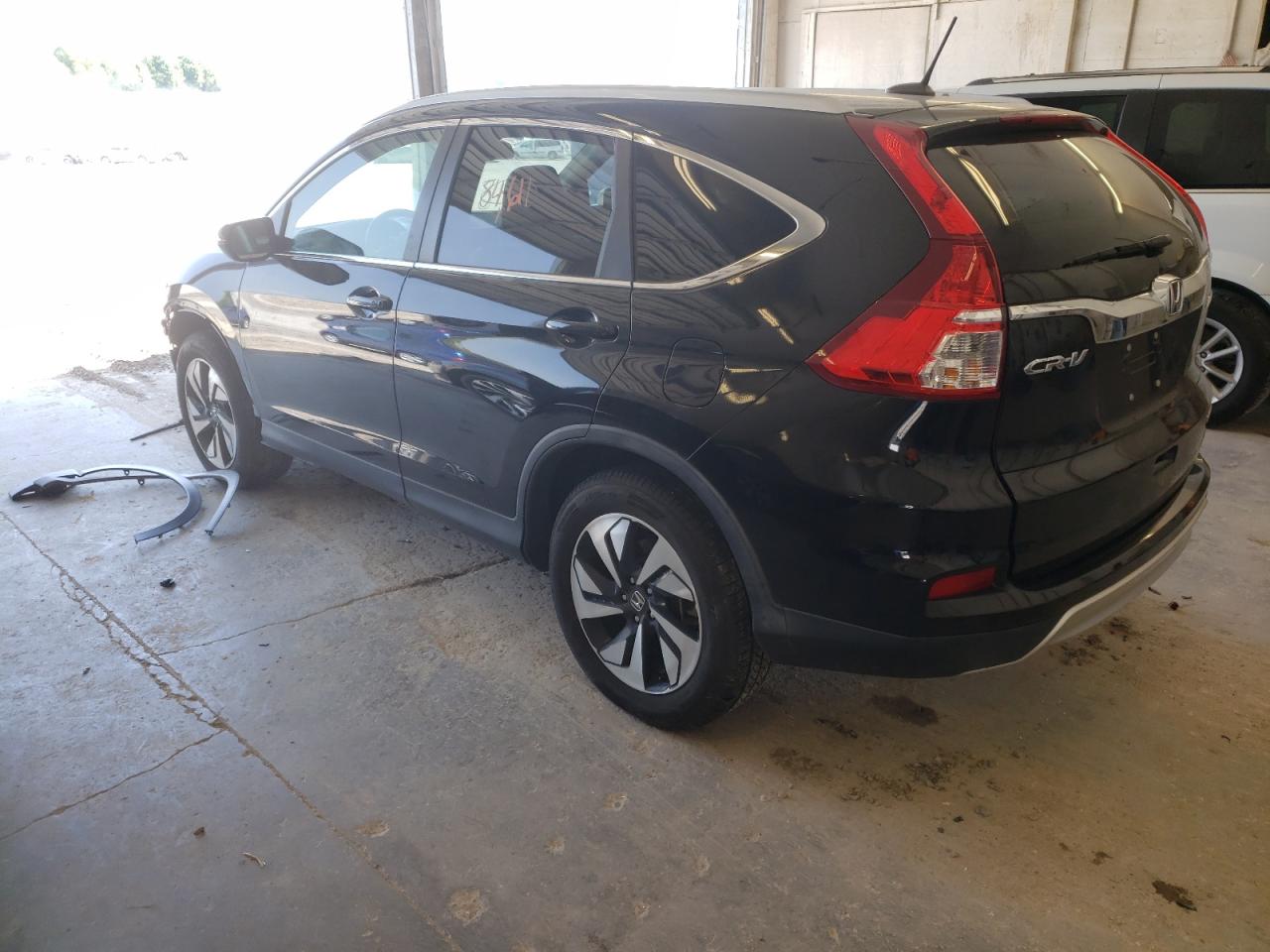 Photo 3 from auction – 2016 HONDA CR-V TOURI with VIN 5J6RM4H95GL046416