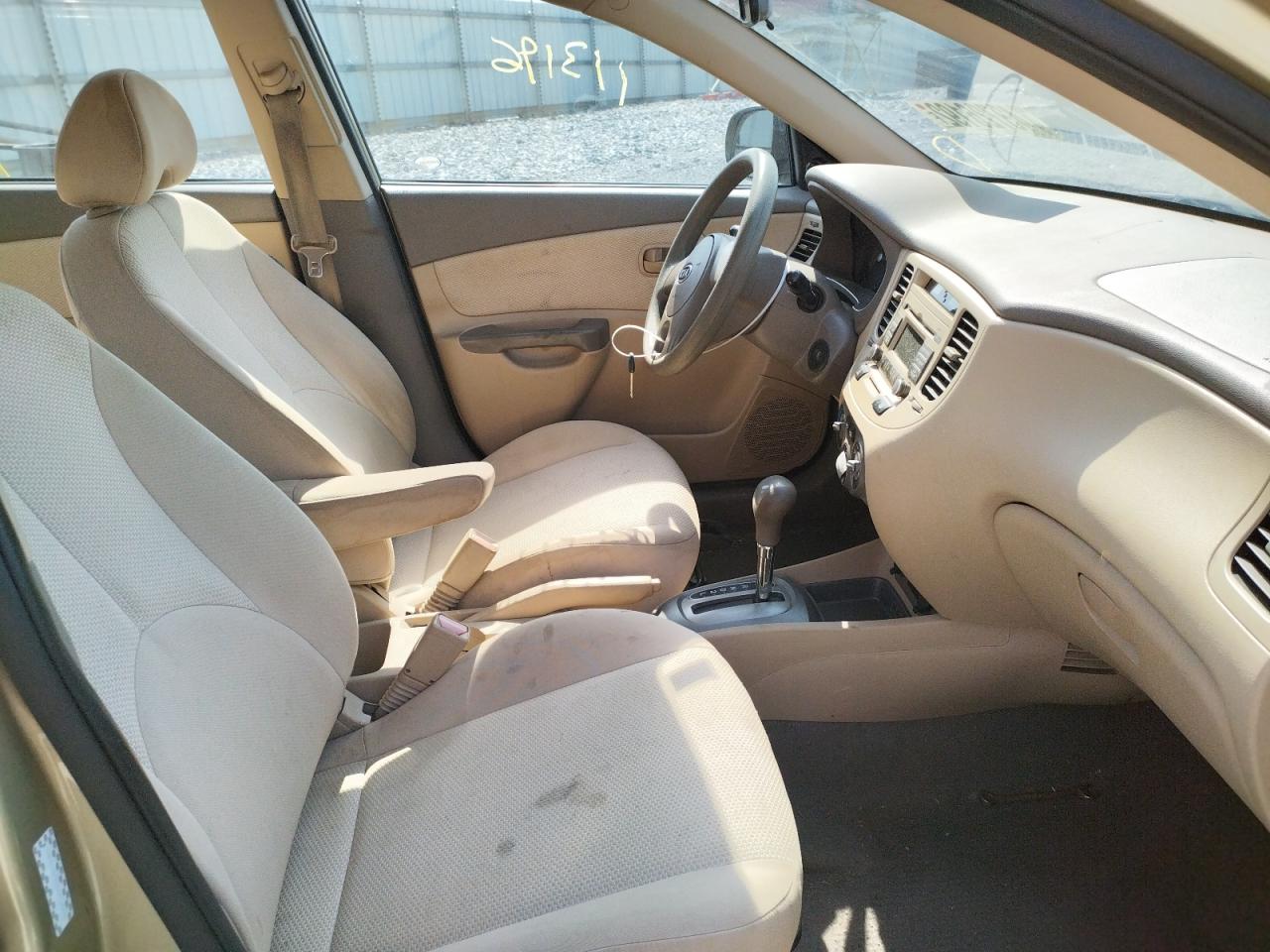 Photo 5 from auction – 2011 KIA RIO BASE with VIN KNADH4A36B6912042