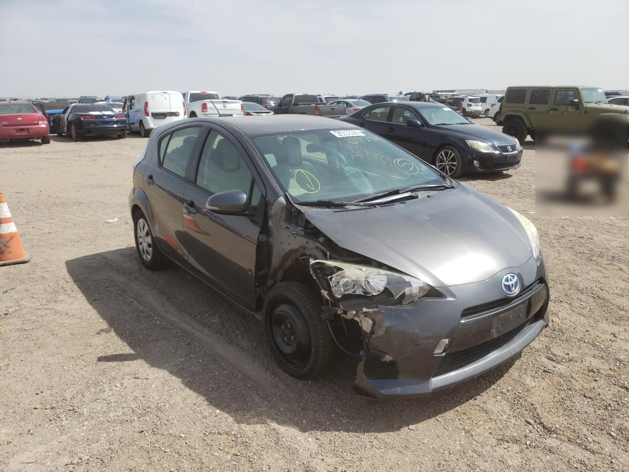 TOYOTA PRIUS C 2014 with VIN JTDKDTB30E1082464 - Photo from auction