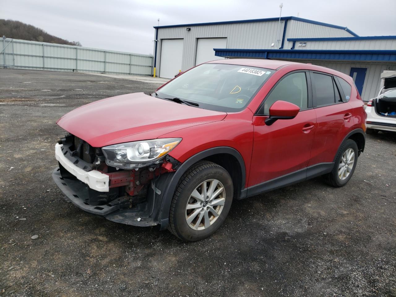 Photo 2 from auction – 2014 MAZDA CX-5 TOURI with VIN JM3KE4CY1E0370293