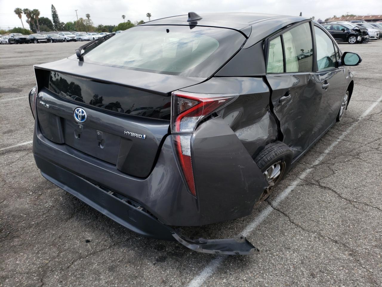 Photo 4 from auction – 2016 TOYOTA PRIUS with VIN JTDKARFUXG3020284