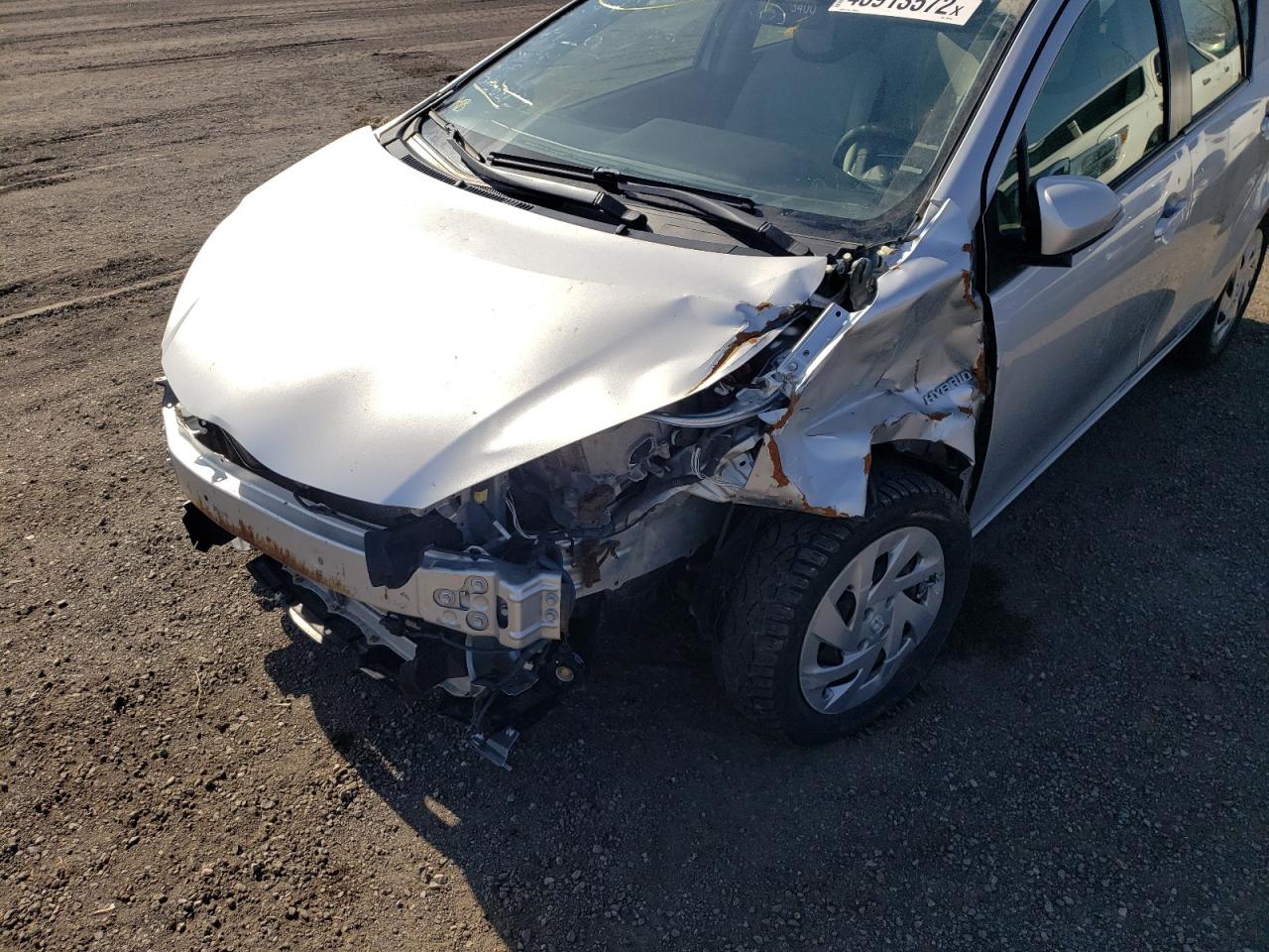 Photo 9 from auction – 2016 TOYOTA PRIUS C with VIN JTDKDTB31G1126443