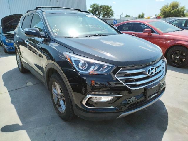 HYUNDAI SANTA FE S 2018 with VIN 5NMZU3LB4JH067759 - Photo from auction