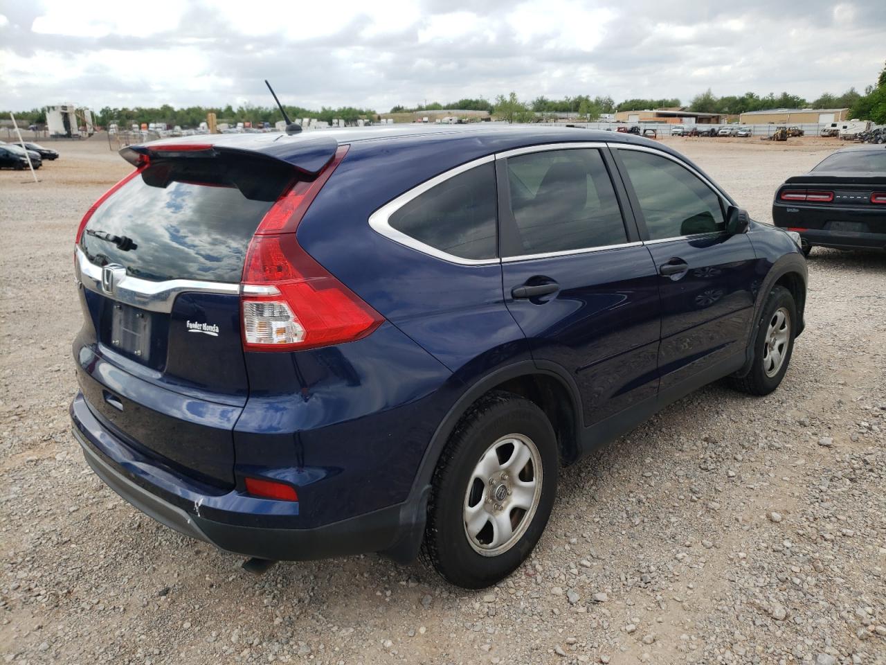 Photo 4 from auction – 2015 HONDA CR-V LX with VIN 3CZRM3H33FG712030