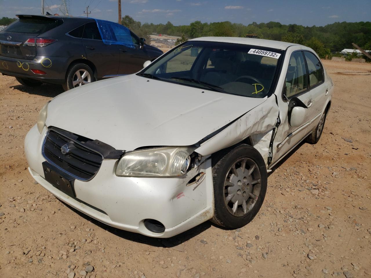 Photo 2 from auction – 2001 NISSAN MAXIMA GXE with VIN JN1CA31D11T609064