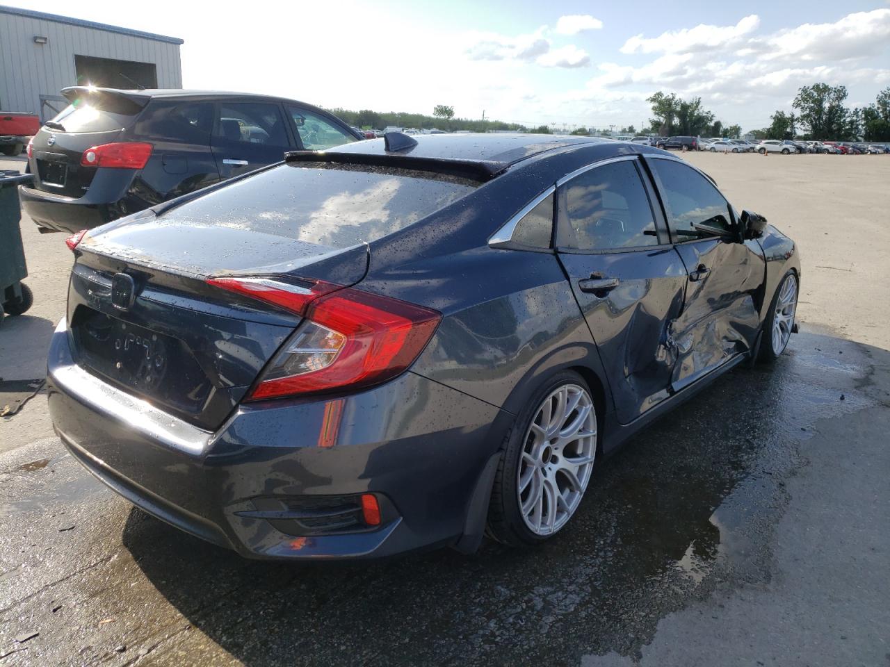 Photo 4 from auction – 2016 HONDA CIVIC EXL with VIN 19XFC1F75GE039583