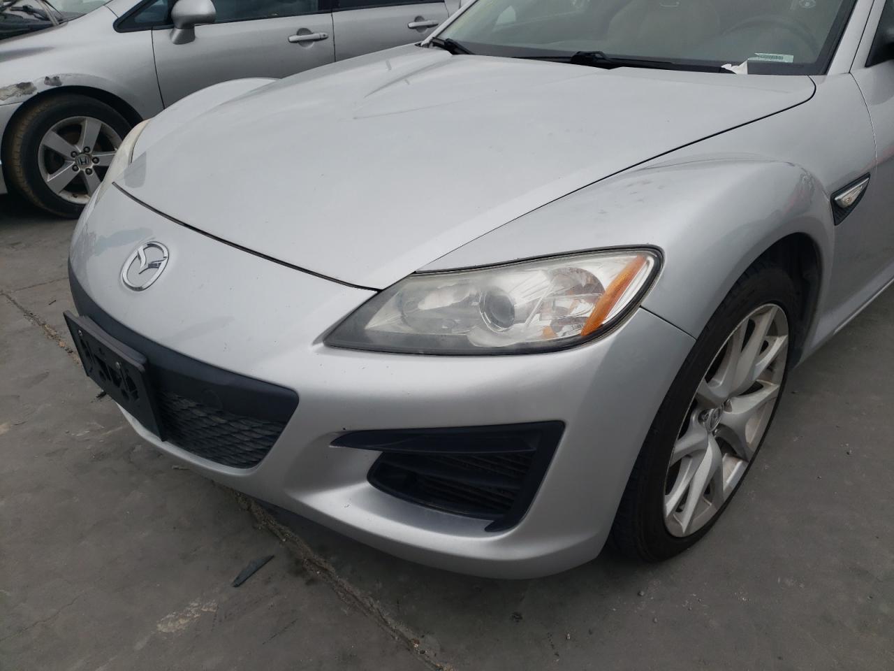 Photo 9 from auction – 2009 MAZDA RX8 with VIN JM1FE17PX90403064