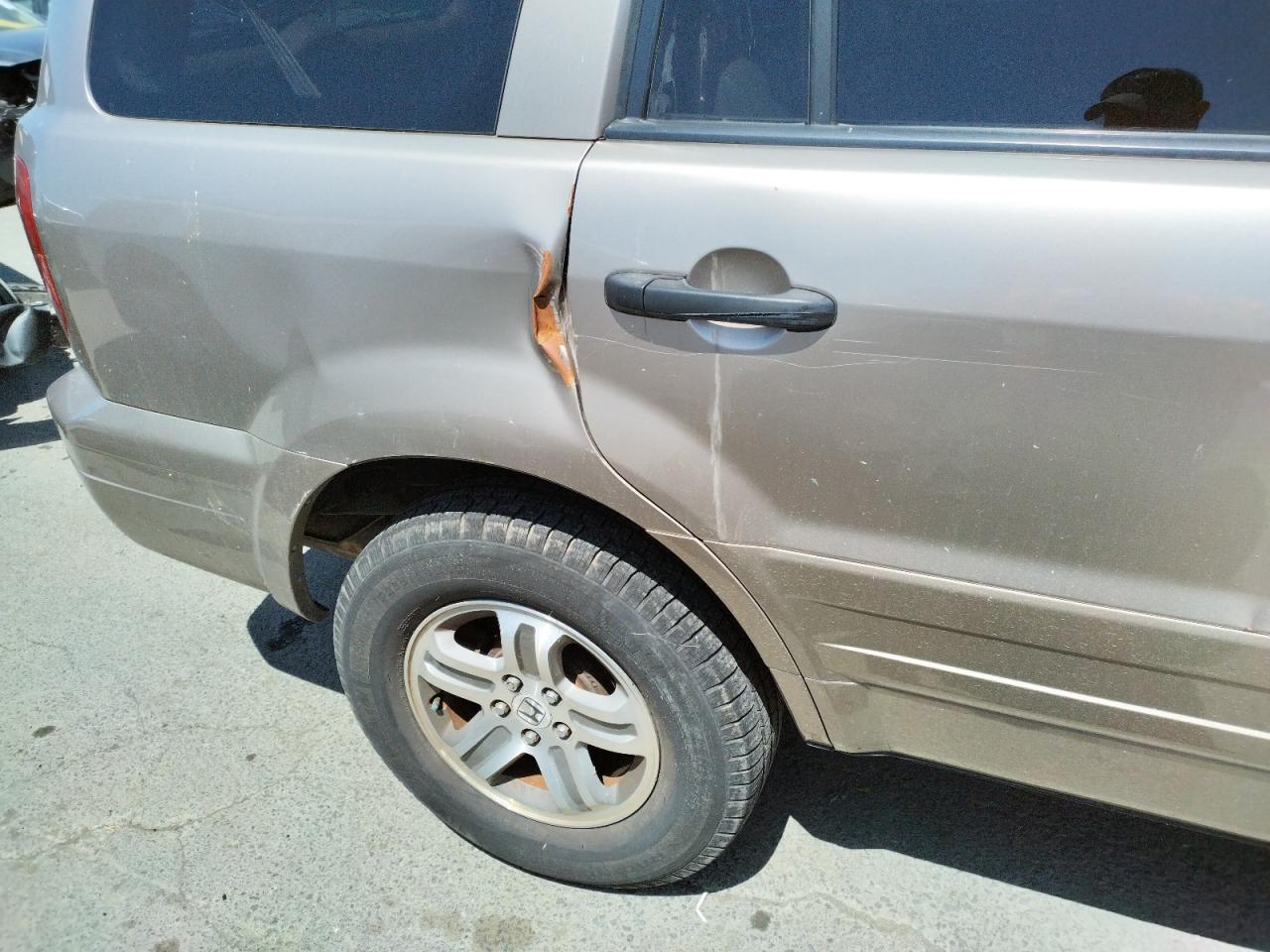 Фото 9 с аукциона – 2004 HONDA PILOT с VIN 2HKYF18594H554072