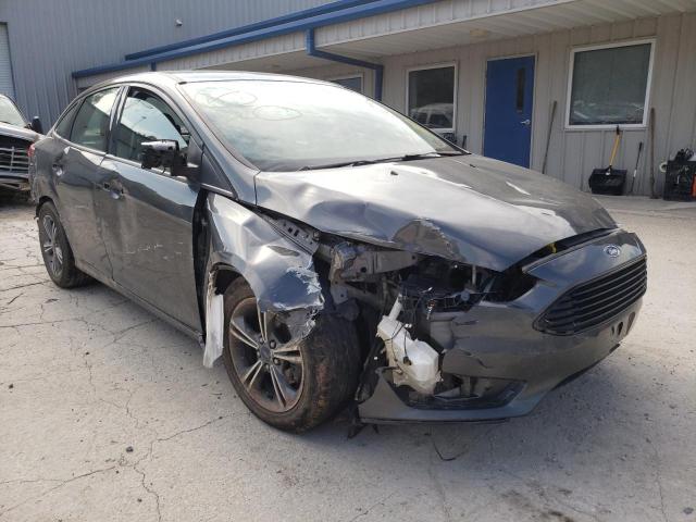 FORD FOCUS SE 2018 with VIN 1FADP3F2XJL210070 - Photo from auction