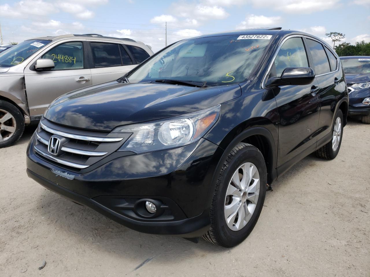 Photo 2 from auction – 2014 HONDA CR-V EX with VIN 2HKRM4H54EH633372