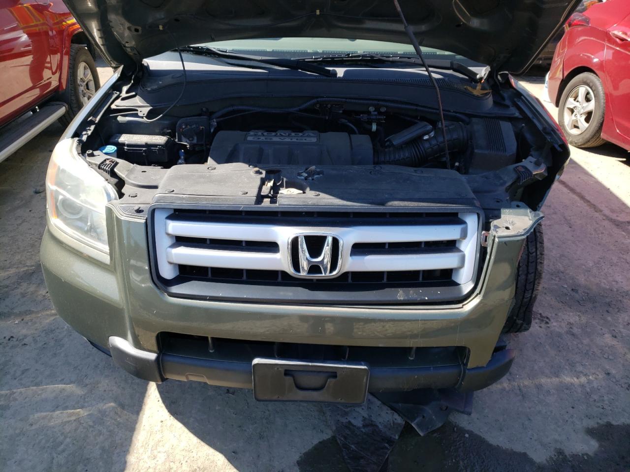 Photo 7 from auction – 2006 HONDA PILOT EX with VIN 2HKYF18676H509191