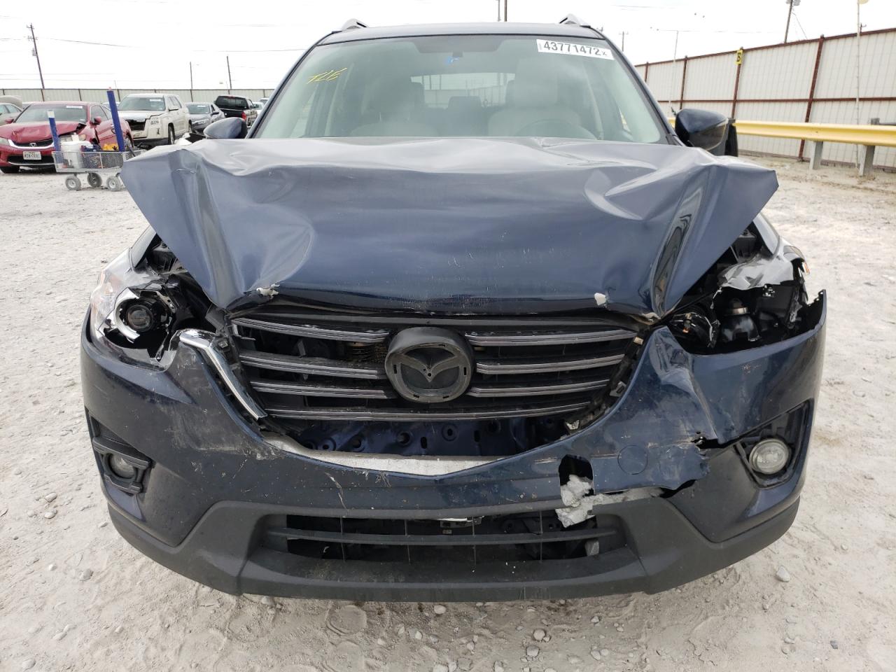 Photo 9 from auction – 2016 MAZDA CX-5 TOURI with VIN JM3KE2CY0G0669541