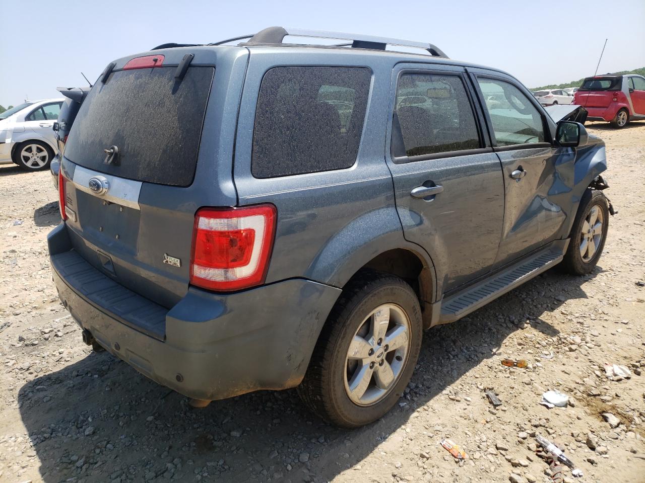 Photo 4 from auction – 2010 FORD ESCAPE LIM with VIN 1FMCU9EG2AKA06637