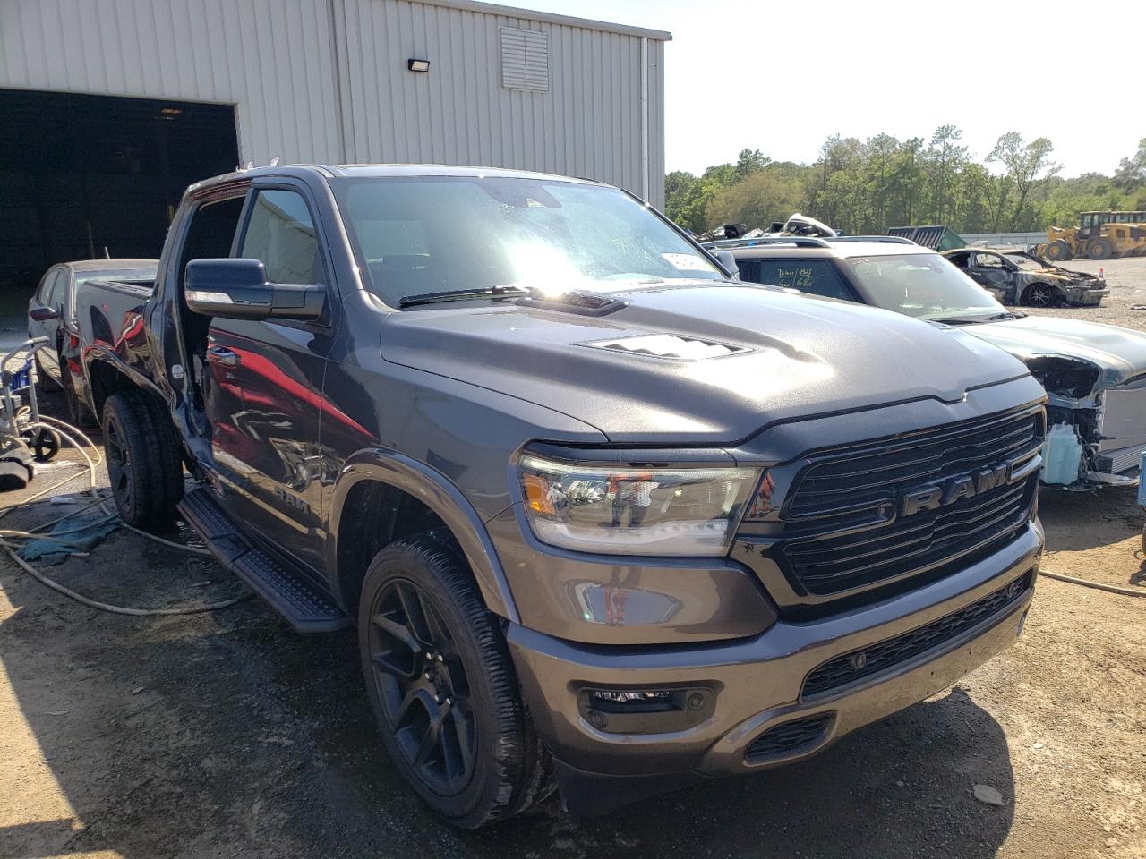 RAM 1500 LARAM 2022 with VIN 1C6SRFJM2NN100301 - Photo from auction