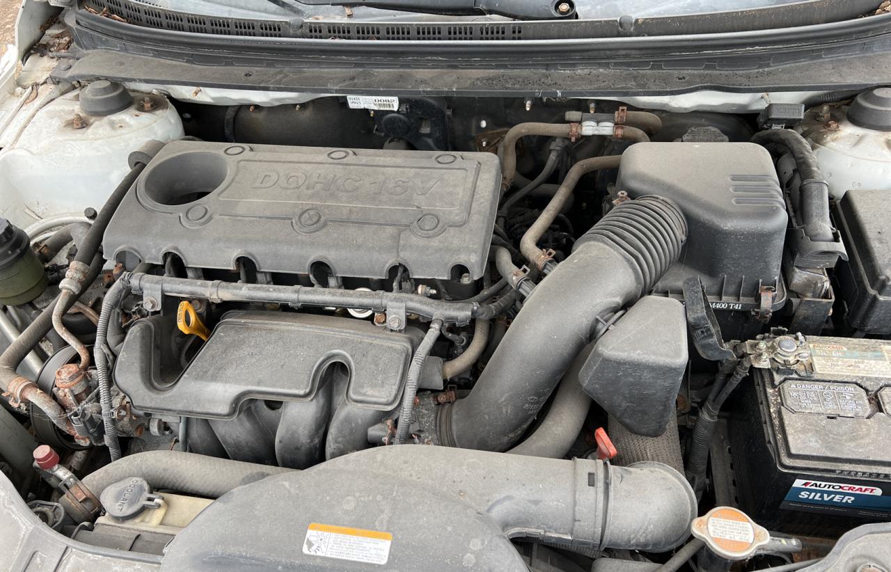 Photo 7 from auction – 2010 KIA FORTE EX with VIN KNAFU4A23A5834691