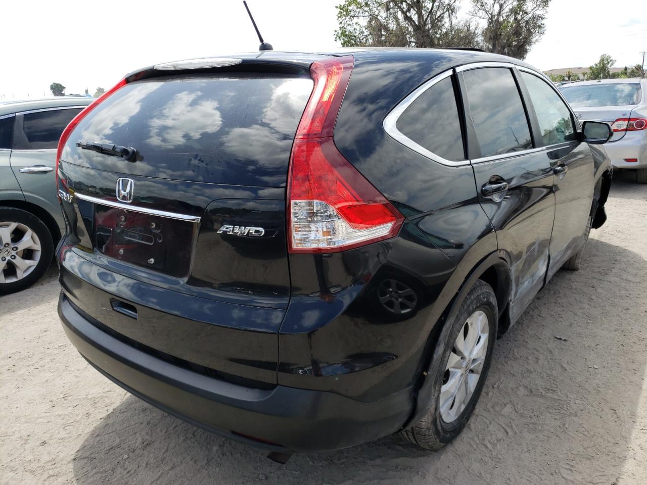 Photo 4 from auction – 2014 HONDA CR-V EX with VIN 2HKRM4H54EH633372