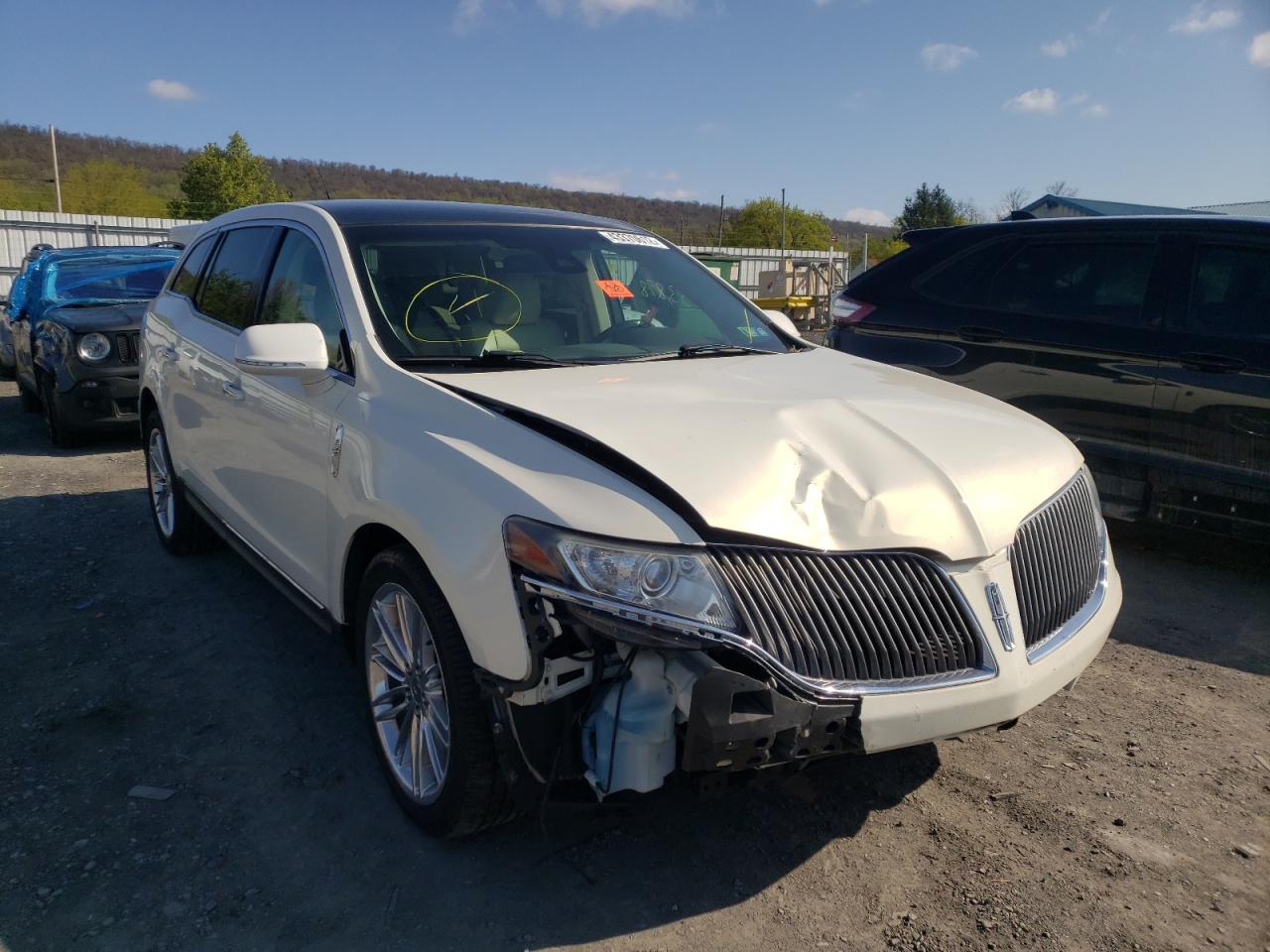 LINCOLN MKT 2013 with VIN 2LMHJ5AT2DBL55021 - Photo from auction