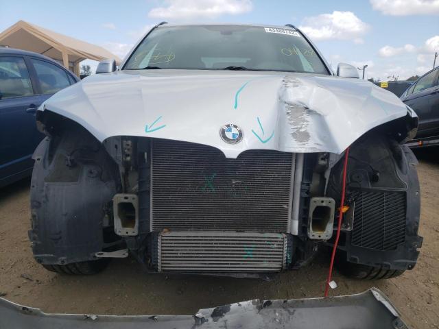 Photo 9 from auction – 2014 BMW X5 XDRIVE3 with VIN 5UXKR0C59E0K45634