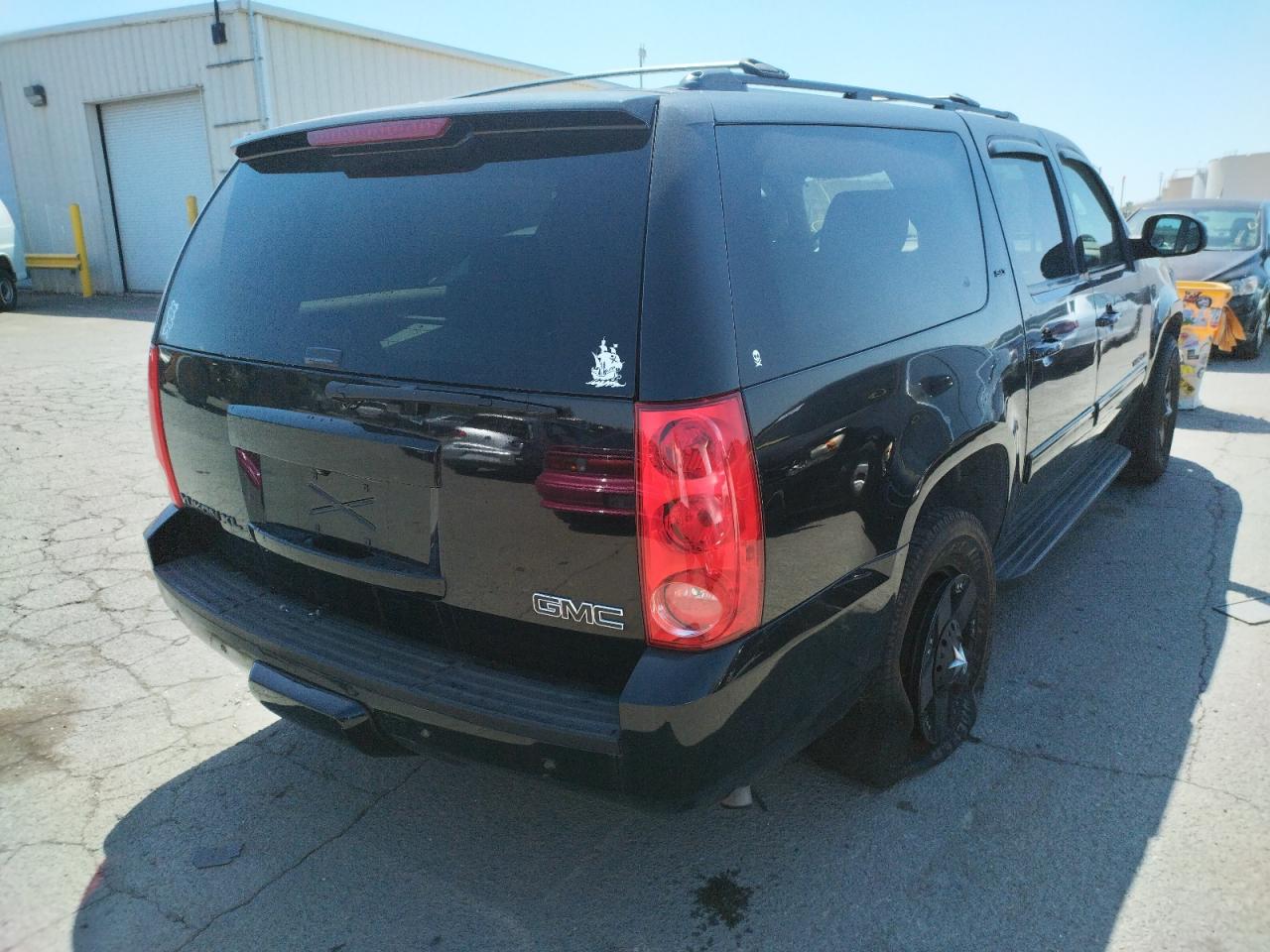 Photo 4 from auction – 2011 GMC YUKON XL K with VIN 1GKS2KE34BR282972