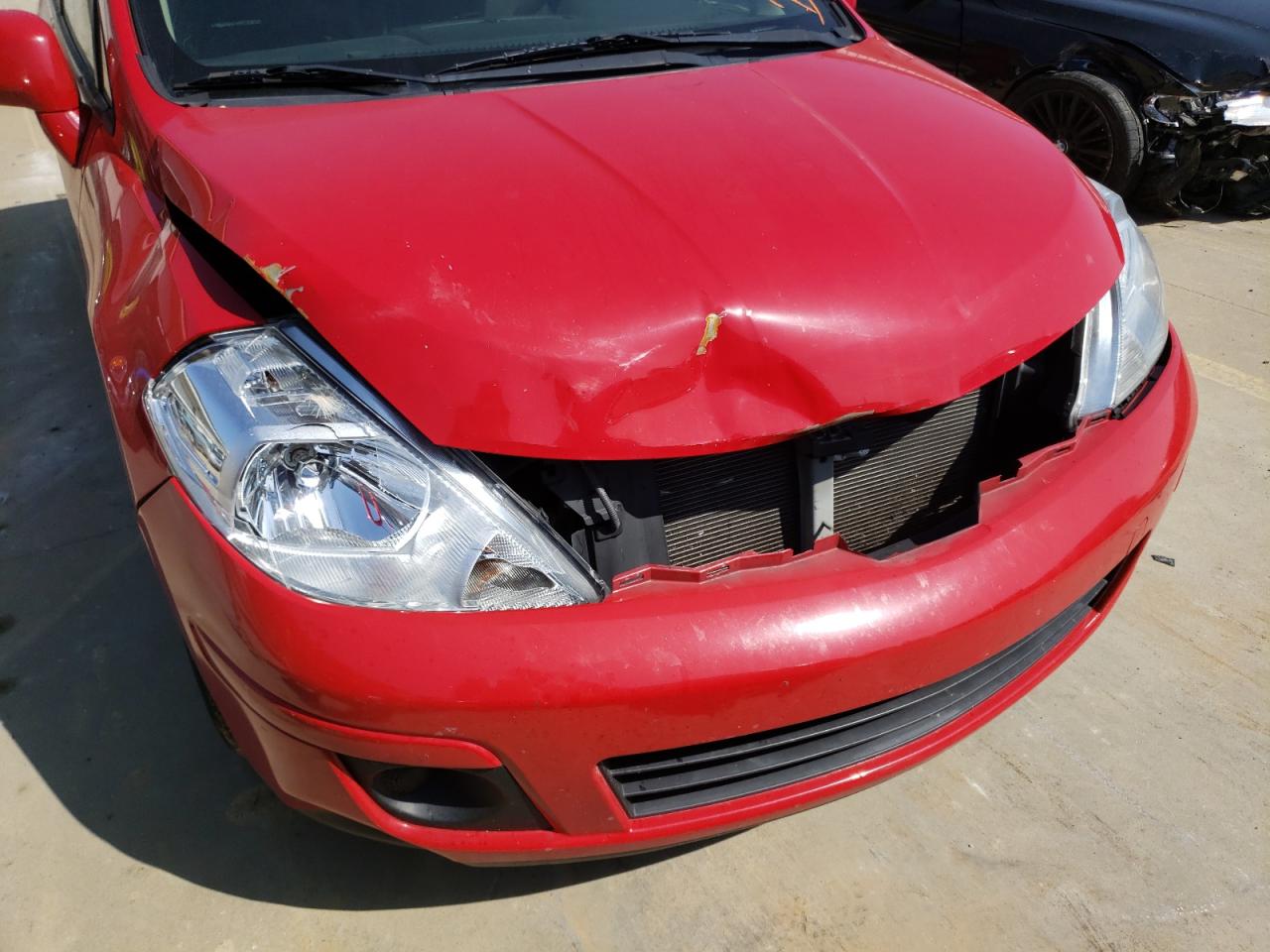 Photo 9 from auction – 2012 NISSAN VERSA S with VIN 3N1BC1CP4CK277099