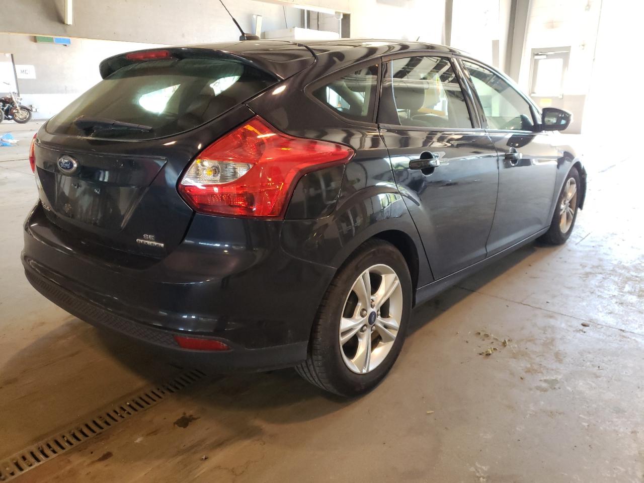 Photo 4 from auction – 2014 FORD FOCUS SE with VIN 1FADP3K28EL153167
