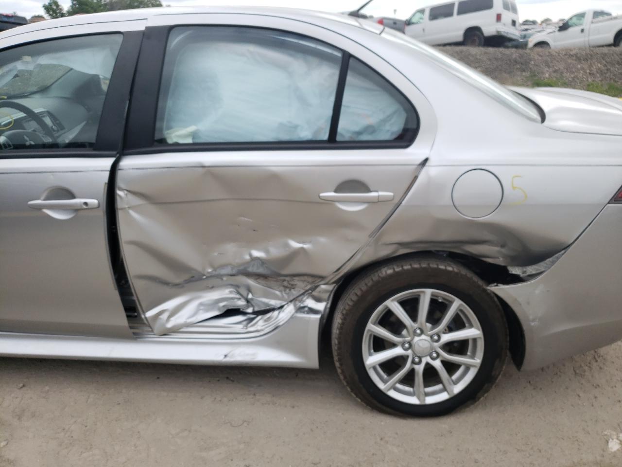 Photo 9 from auction – 2016 MITSUBISHI LANCER with VIN JA32U2FU9GU006657