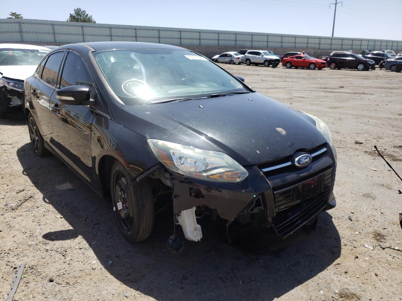 FORD FOCUS SE 2014 with VIN 1FADP3F29EL218957 - Photo from auction