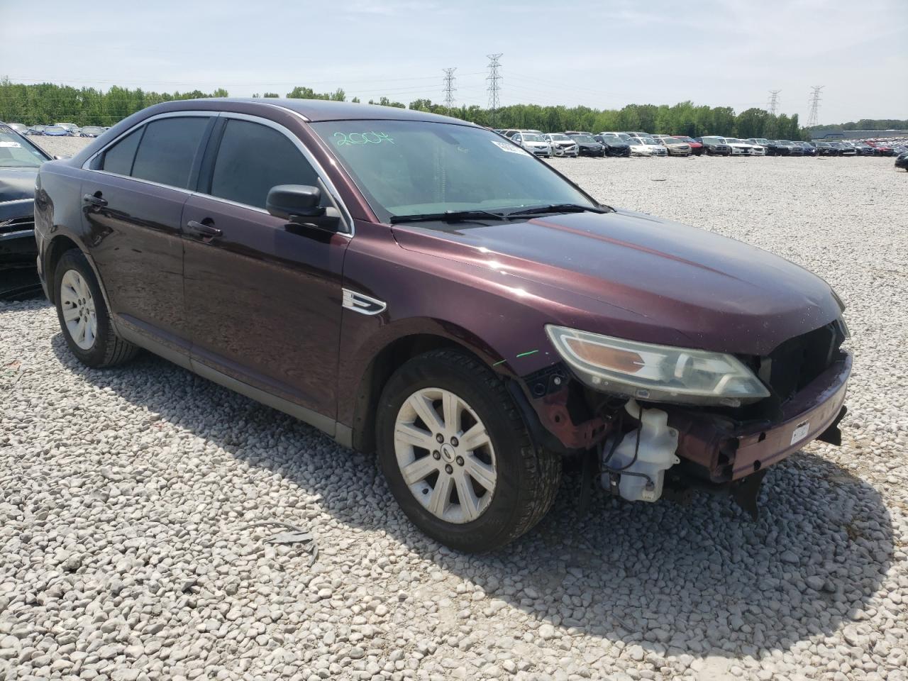 FORD TAURUS SE 2011 with VIN 1FAHP2DW5BG179340 - Photo from auction