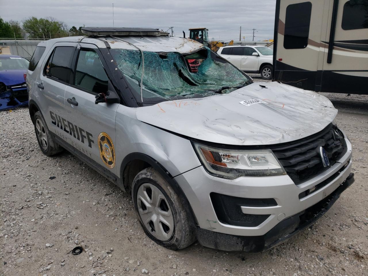 FORD EXPLORER P 2016 with VIN 1FM5K8AR1GGA04423 - Photo from auction