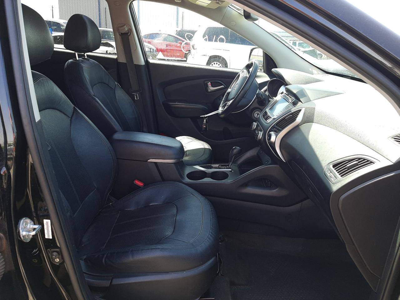 Photo 5 from auction – 2012 HYUNDAI TUCSON GLS with VIN KM8JUCAC4CU477753