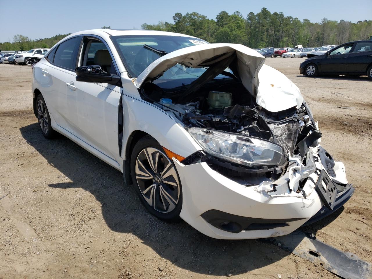 HONDA CIVIC EXL 2017 with VIN 2HGFC1F72HH633443 - Photo from auction
