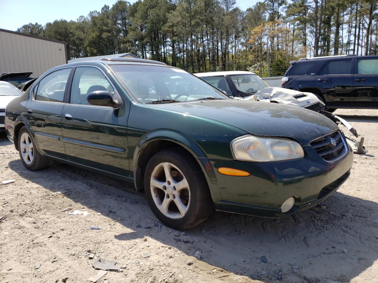 NISSAN MAXIMA GLE 2000 with VIN JN1CA31D8YT724643 - Photo from auction