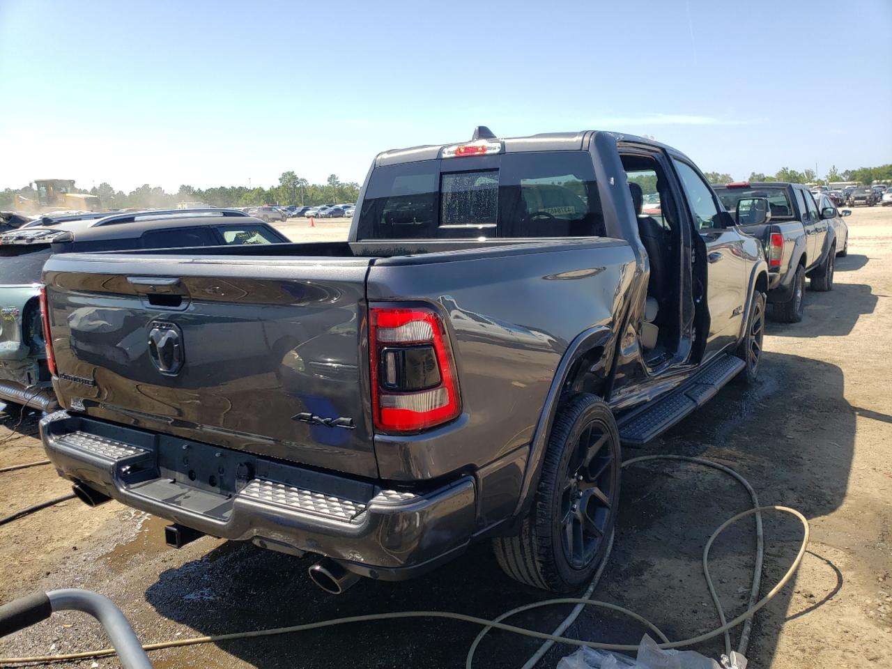Photo 4 from auction – 2022 RAM 1500 LARAM with VIN 1C6SRFJM2NN100301