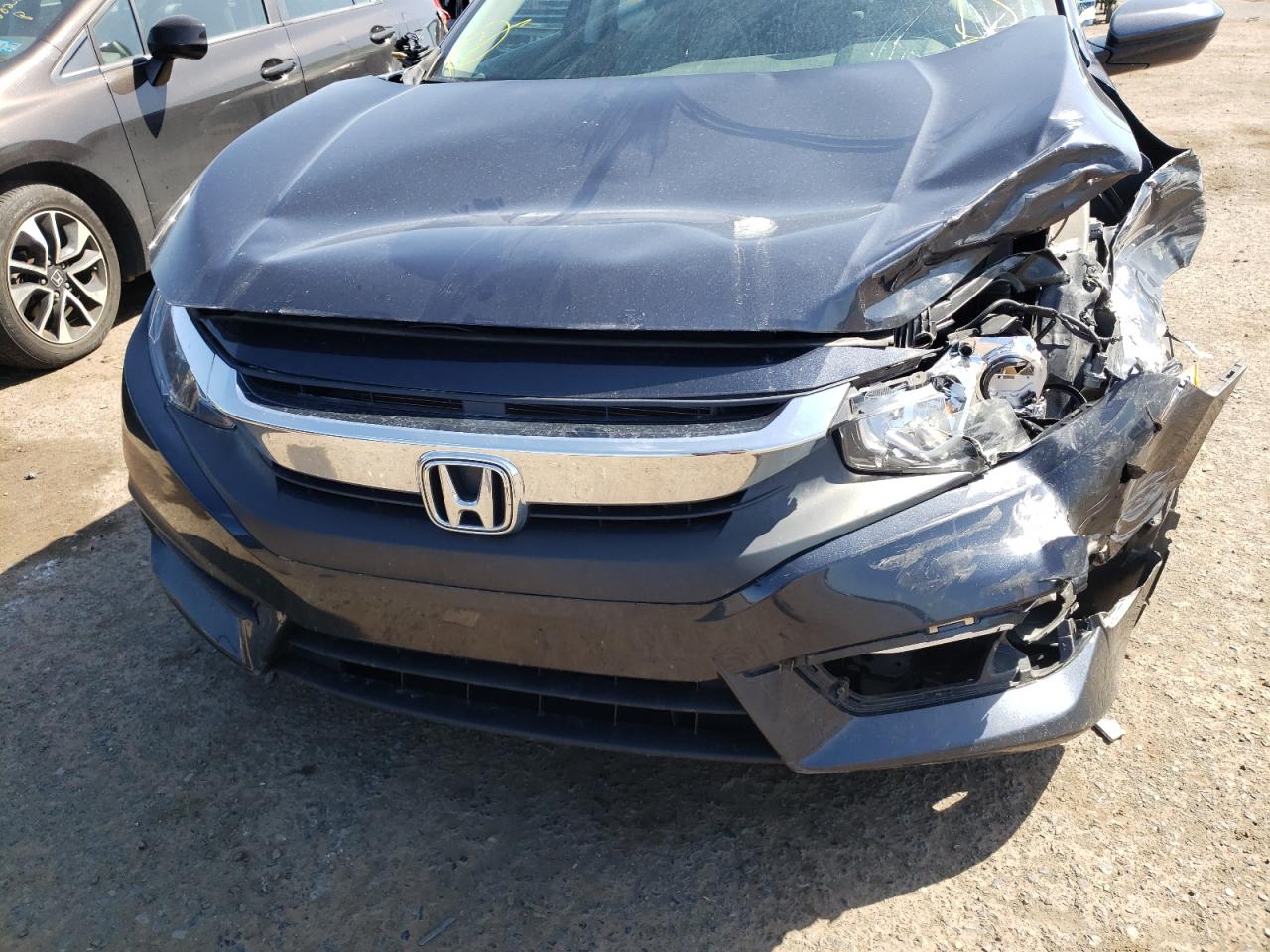 Photo 9 from auction – 2017 HONDA CIVIC EX with VIN 2HGFC2F74HH568732