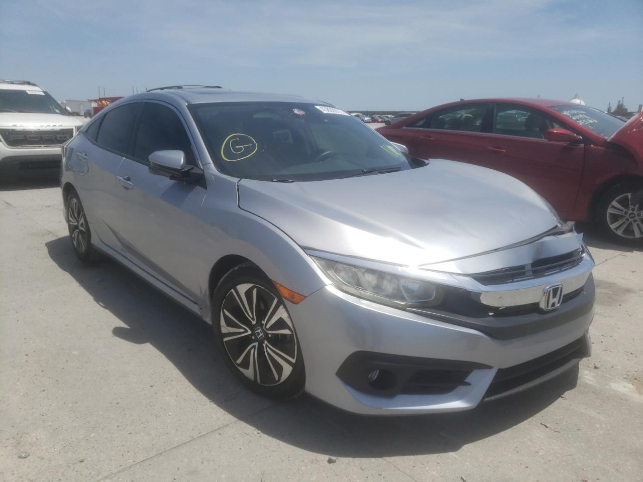 Photo 1 from auction – 2018 HONDA CIVIC EX with VIN JHMFC1F38JX004152