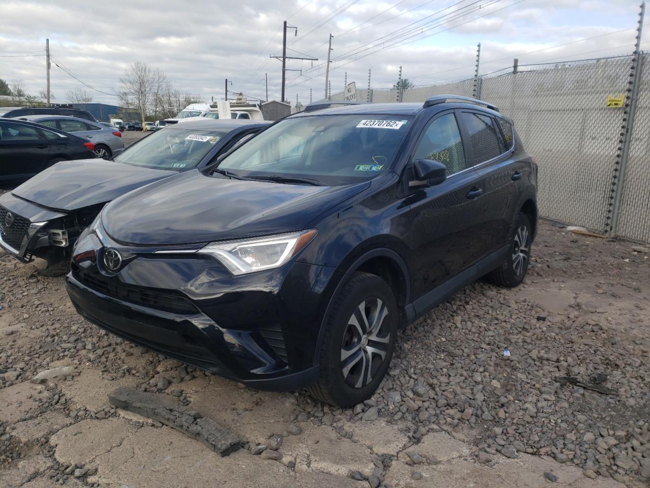 Photo 2 from auction – 2017 TOYOTA RAV4 LE with VIN 2T3BFREV0HW592572