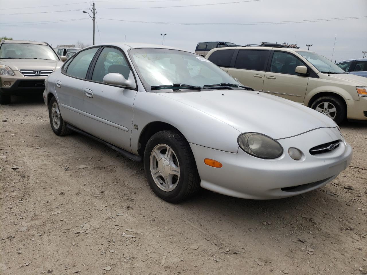 FORD TAURUS SE 1999 with VIN 1FAFP53S8XA124284 - Photo from auction
