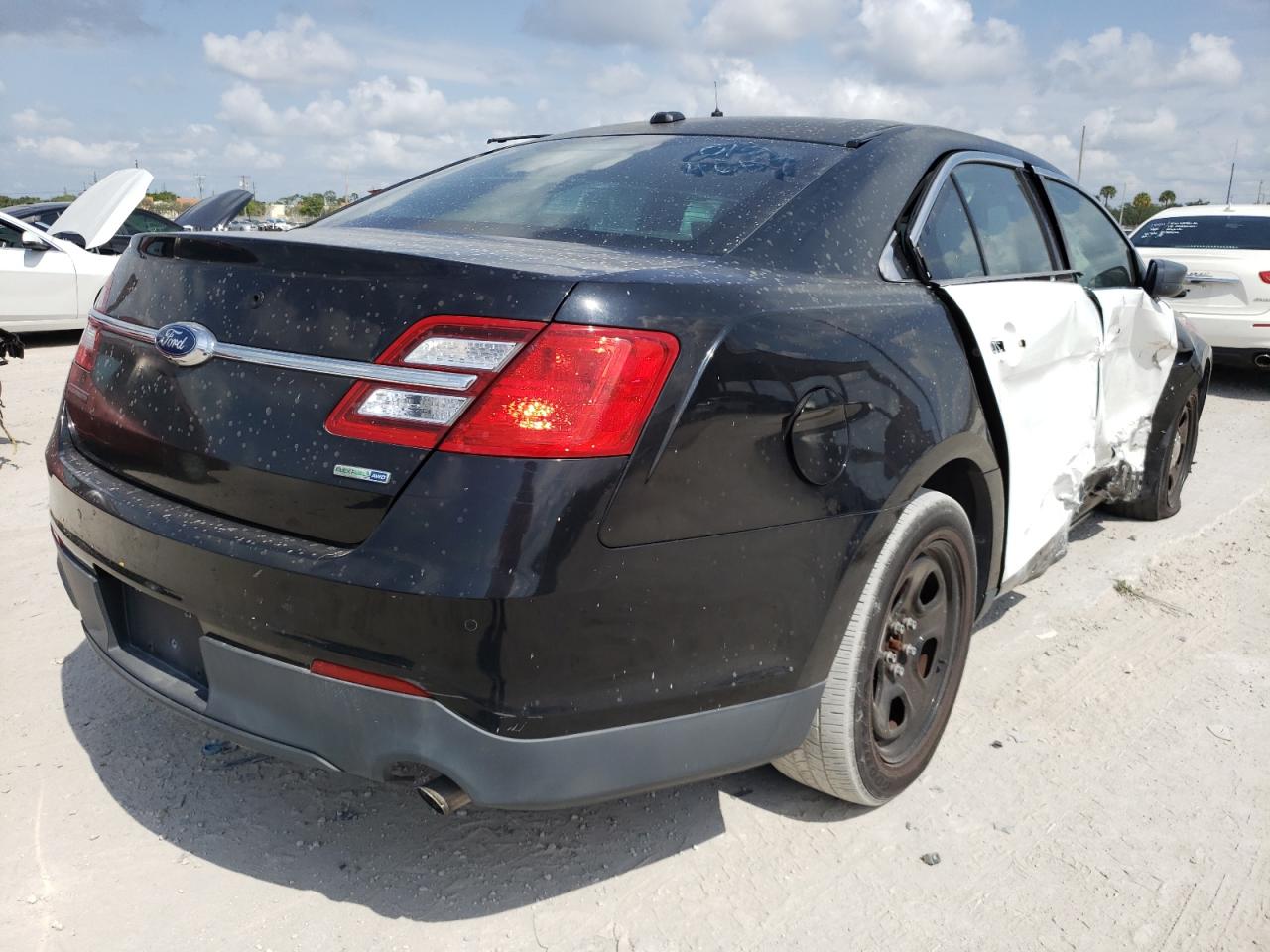 Photo 4 from auction – 2016 FORD TAURUS POL with VIN 1FAHP2MK4GG111762
