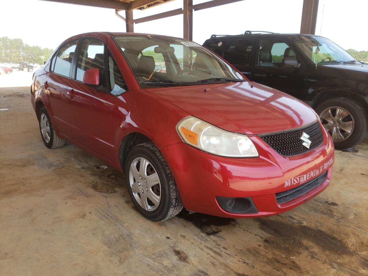 SUZUKI SX4 LE 2012 with VIN JS2YC5A30C6300483 - Photo from auction