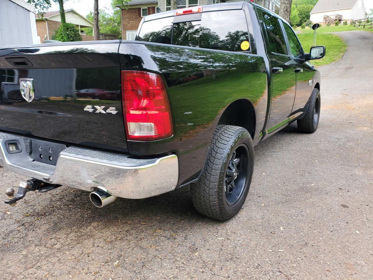 Photo 4 from auction – 2014 RAM 1500 SLT with VIN 1C6RR7LT0ES405208