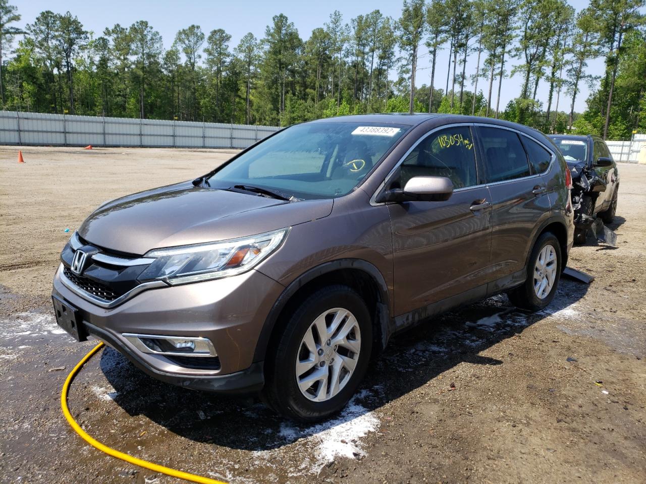 Photo 2 from auction – 2015 HONDA CR-V EX with VIN 2HKRM3H53FH503272