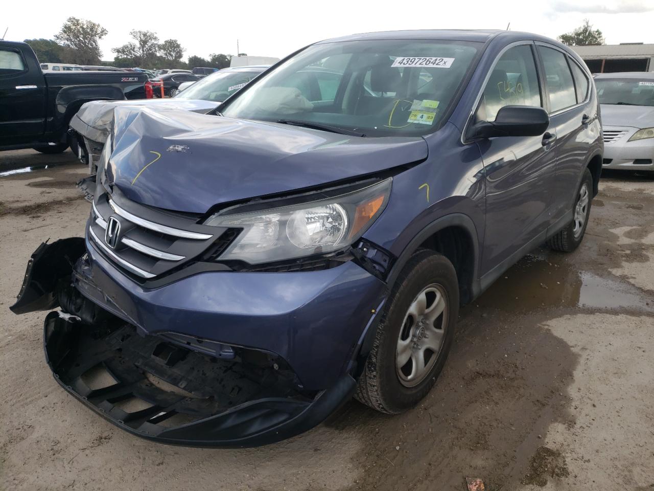 Photo 2 from auction – 2014 HONDA CR-V LX with VIN 2HKRM4H35EH637560