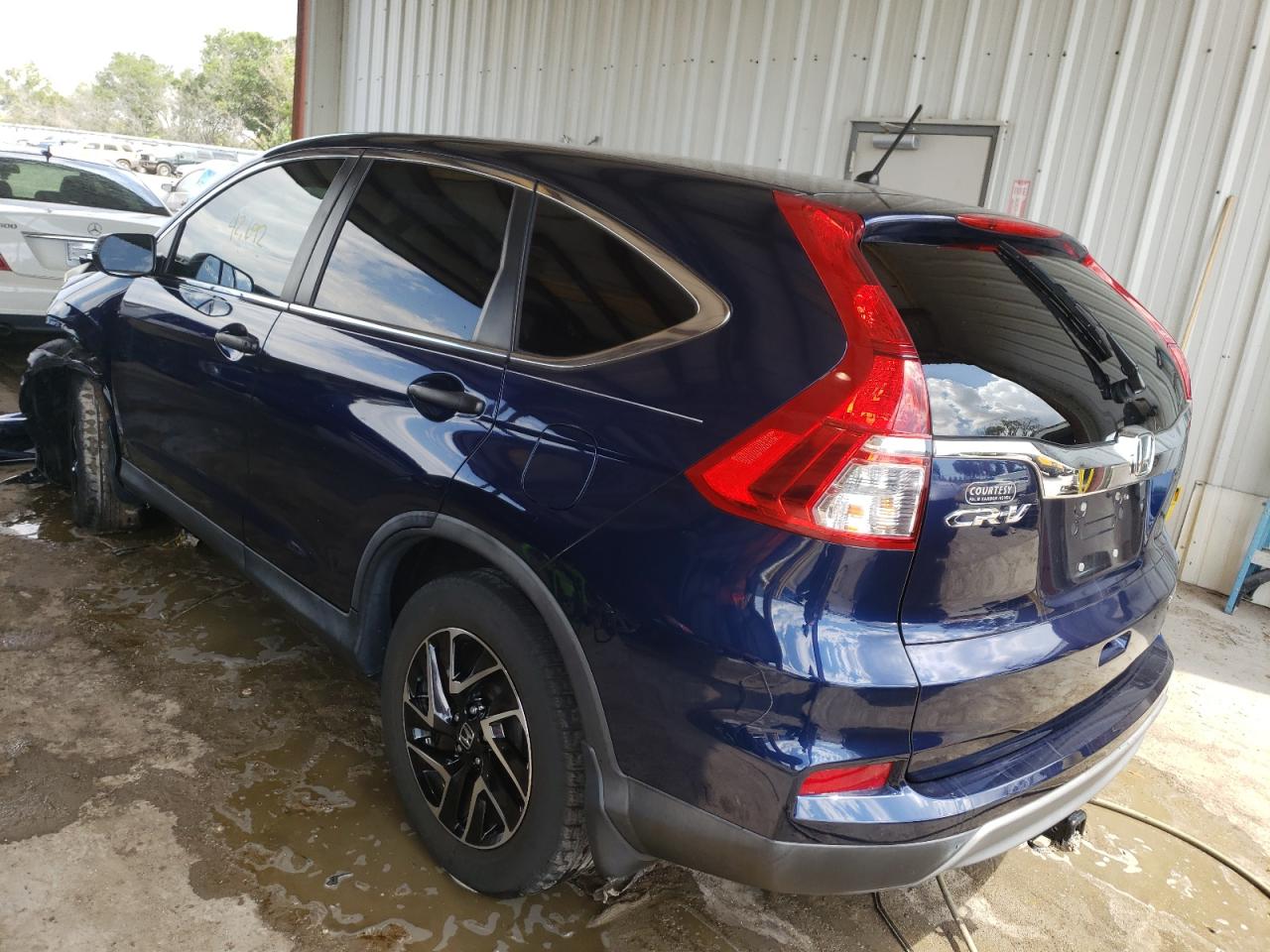 Photo 3 from auction – 2016 HONDA CR-V SE with VIN 2HKRM3H41GH522749
