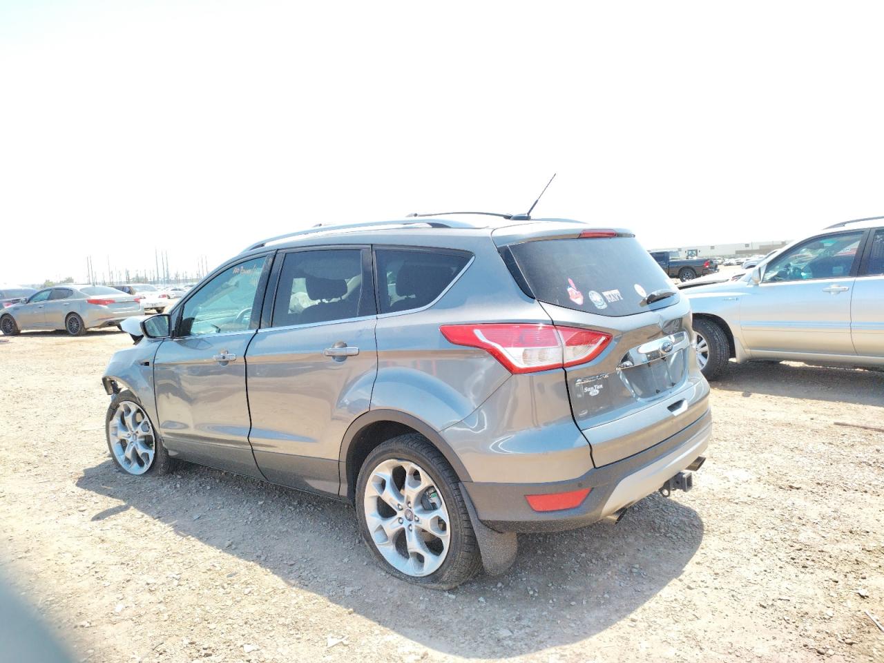 Photo 3 from auction – 2014 FORD ESCAPE TIT with VIN 1FMCU9J96EUD37402