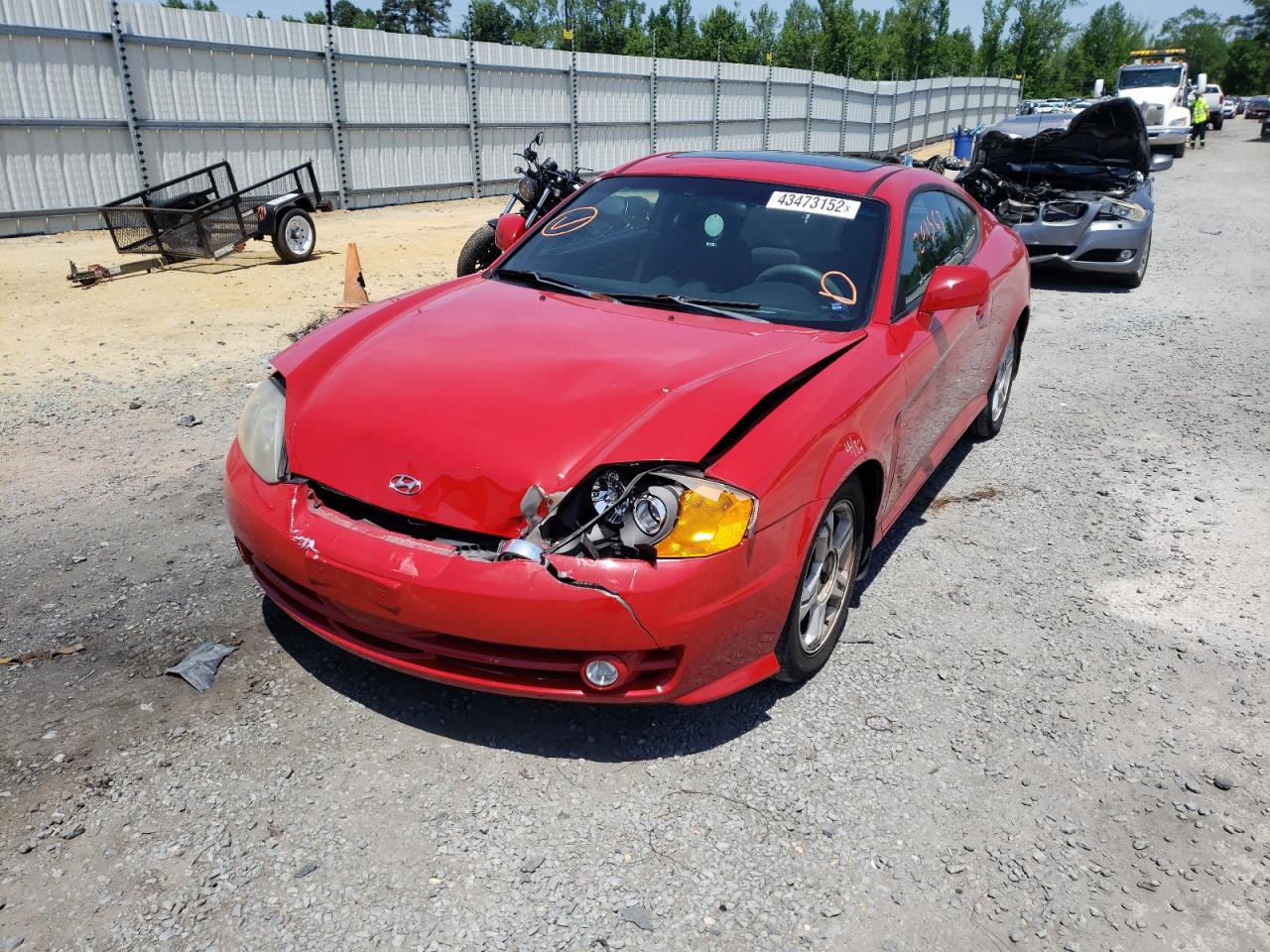 Photo 2 from auction – 2004 HYUNDAI TIBURON with VIN KMHHM65D34U107236